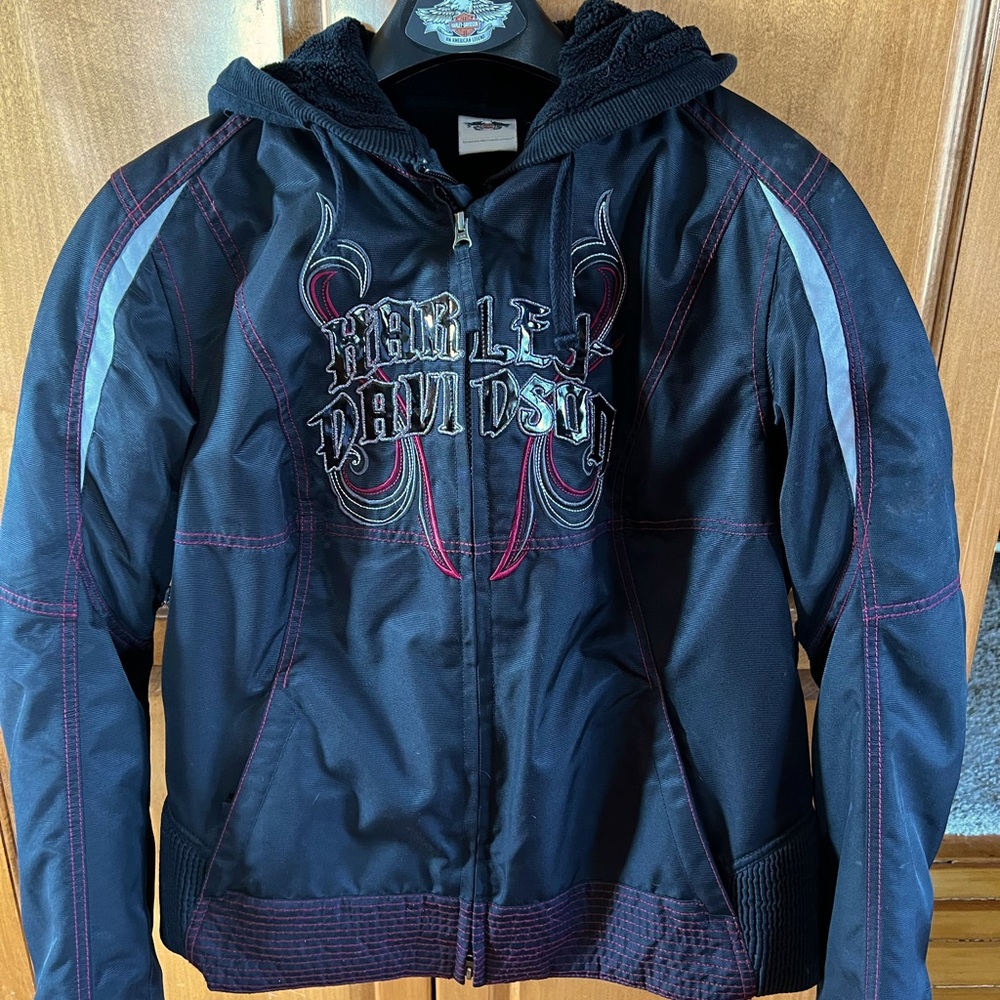 Women’s Harley Davidson XL nylon riding jacket w/removable sweatshirt.